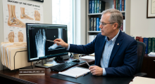 physician-attorney-reviewing-cartiva-implant-failure-xray